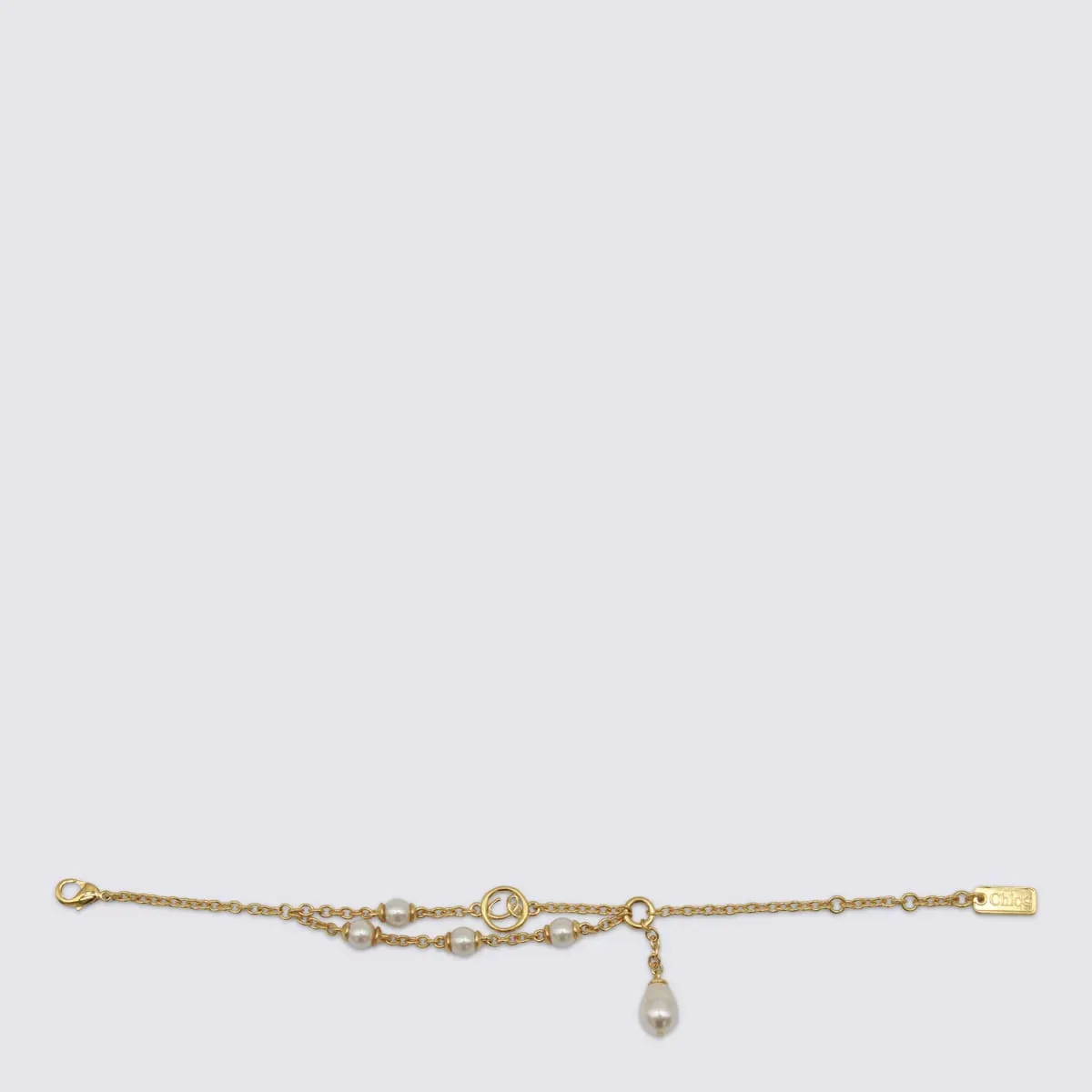 Gold And Pearly Bras Bracelet